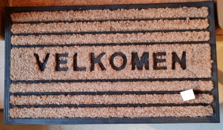 Dørmatte, VELKOMEN